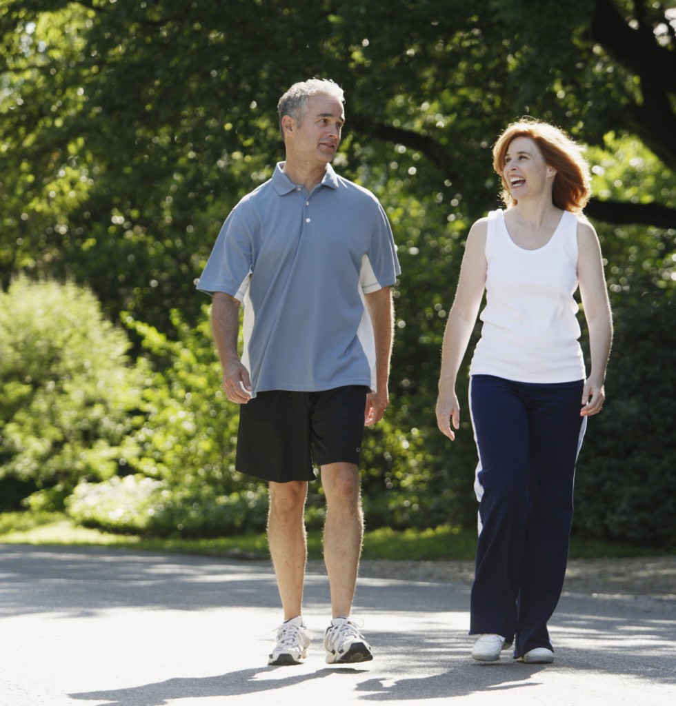 Mature Couple Exercising Outdoors