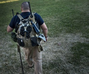 Jay Blevins walks to his backyard with a bug out bag, a quick grab bag with about 40 pounds of survival gear including a Katana sword, December 5, 2012 in Berryville, Virginia. Jay Blevins and his wife Holly Blevins have been preparing with a group of others for a possible doomsday scenario where the group will have to be self sufficient due to catastrophe or civil unrest. AFP PHOTO/Brendan SMIALOWSKI